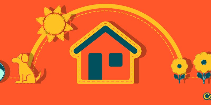 Rotes Sommerhaus, umgeben von Sommerblumen und einem Hund, der mit Ball spielt