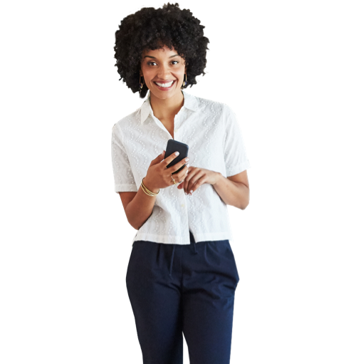 A woman is talking into a mobile phone and smiling