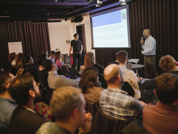 Attendees gather at 1 year event