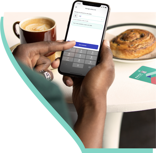 Image of someone using Zopa app over breakfast