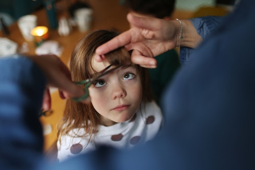 Child having her haircut