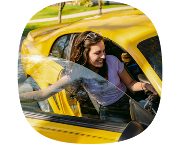 woman getting into car