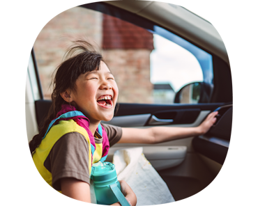 girl happy in car