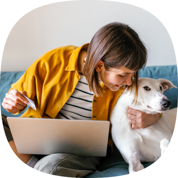 Woman kissing dog