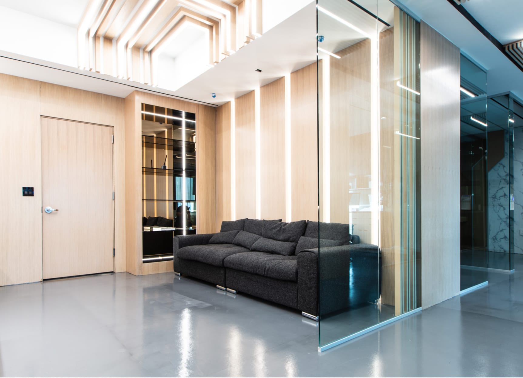 Waiting Lounge - clean with large comfortable looking couch. 