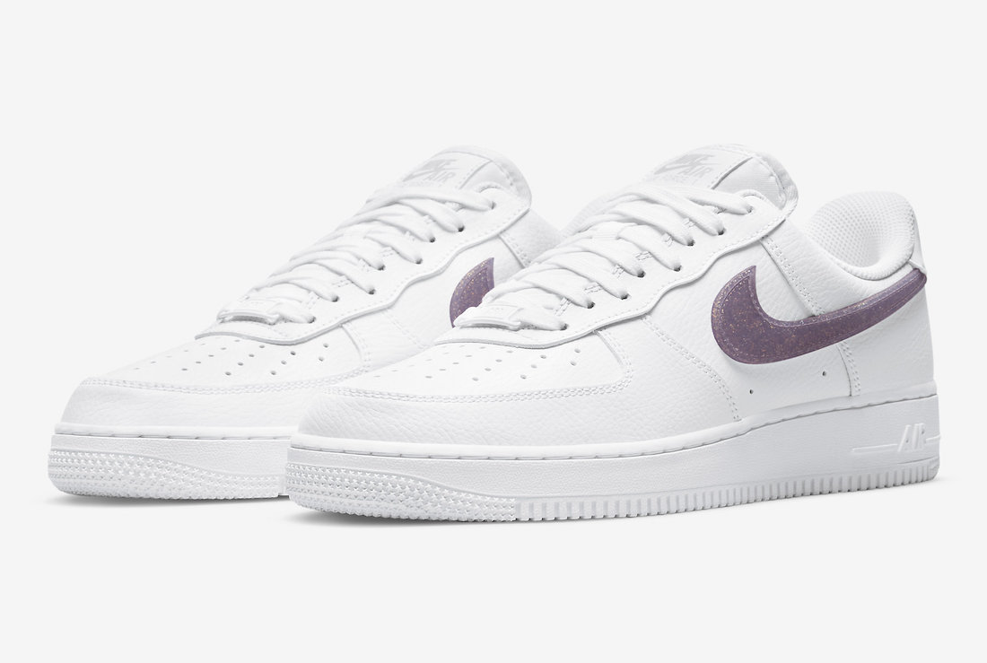 white nikes with purple swoosh
