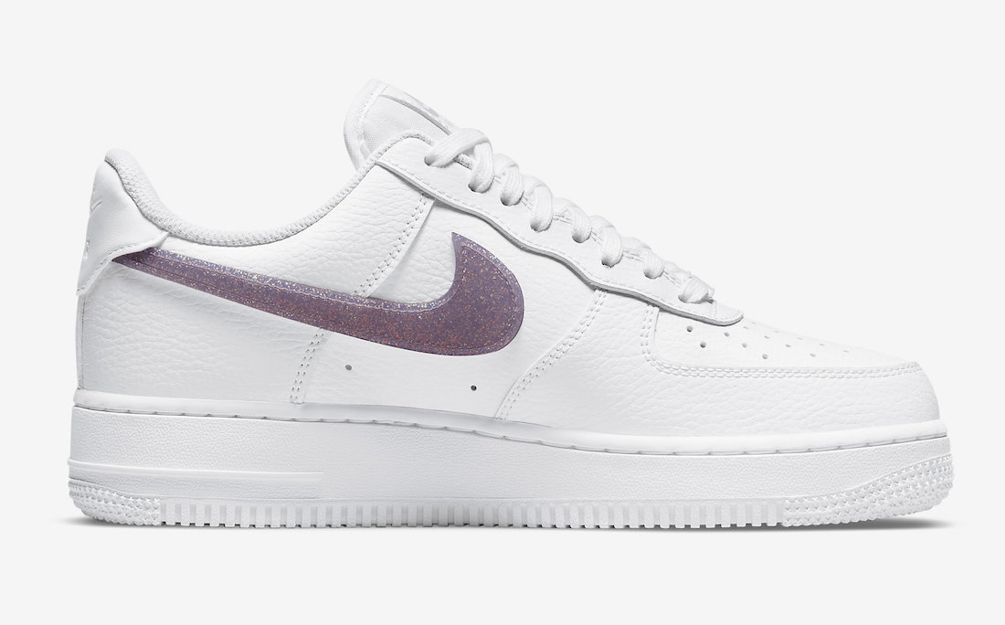 white nikes with purple swoosh