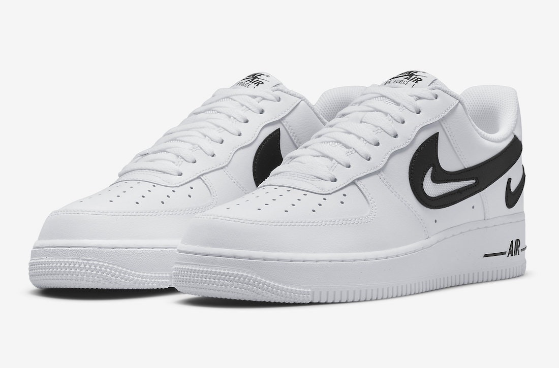 Black nike sneakers with white swoosh outlet