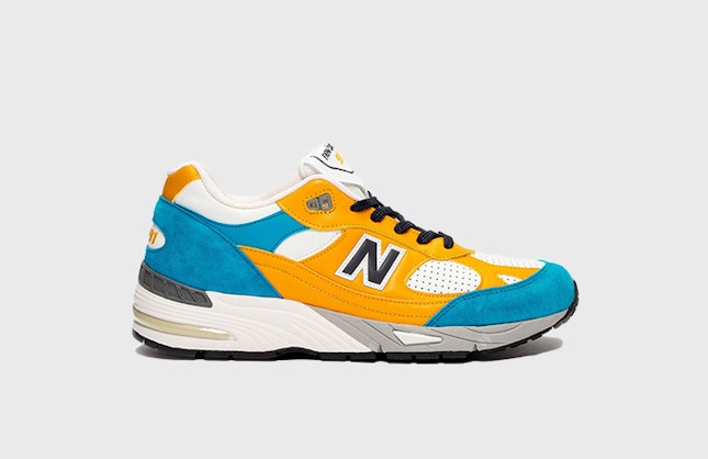SNS x New Balance 991 "Laser Orange"