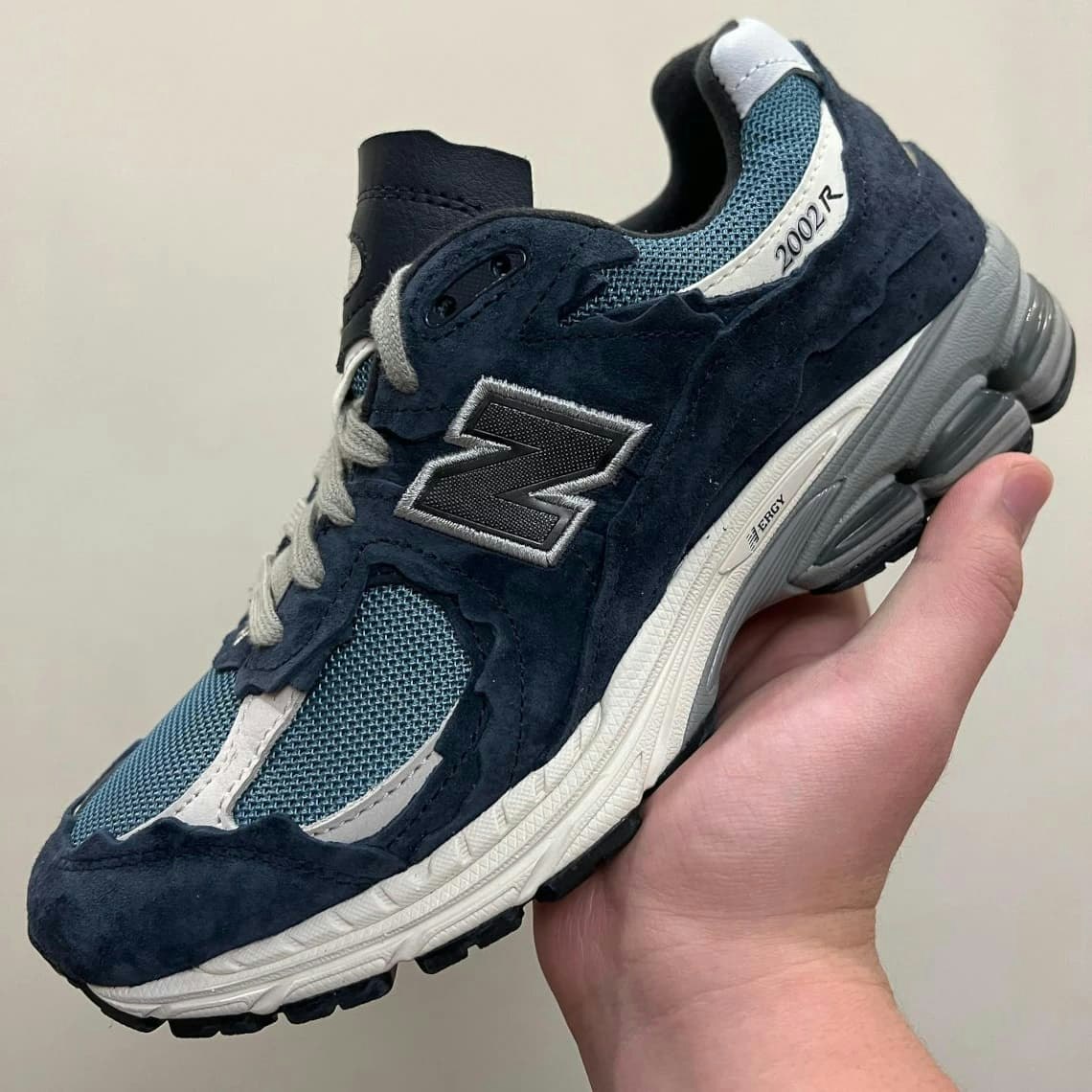 New Balance 2002R "Protection Pack" Blau, Grau & Orange