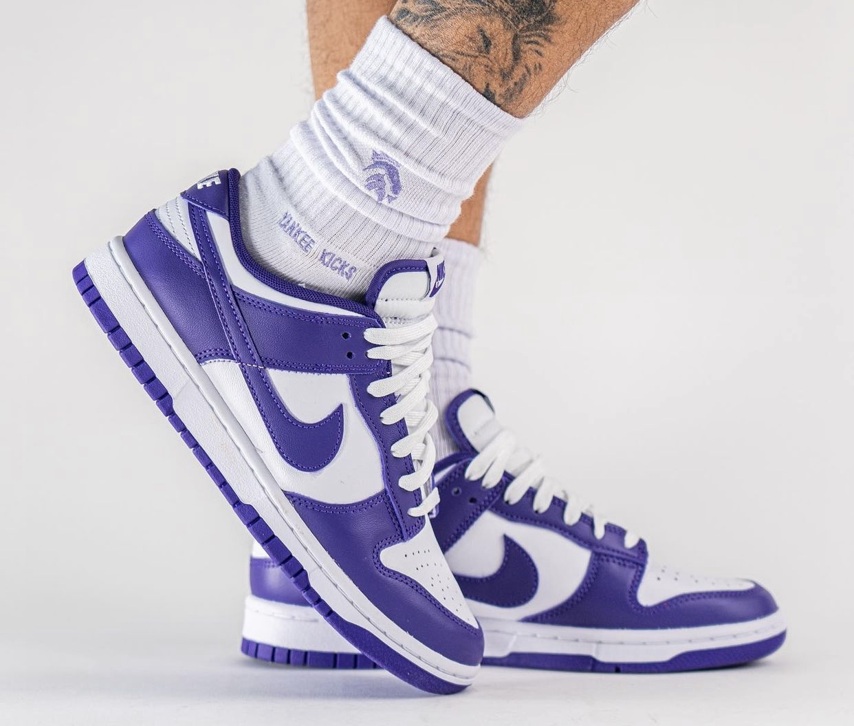 purple nike low