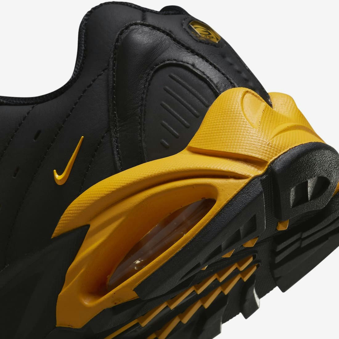 NOCTA x Nike Hot Step Air Terra "Black/University Gold"