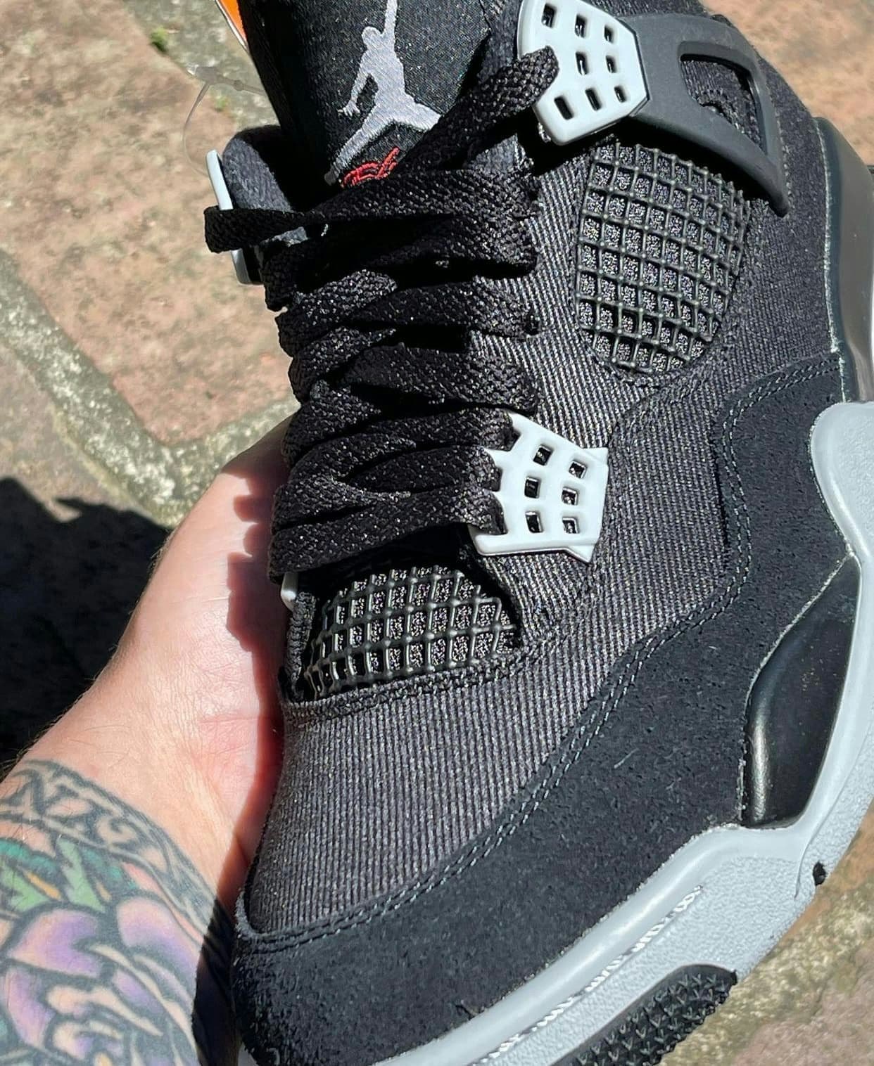 Air Jordan 4 "Black Canvas"