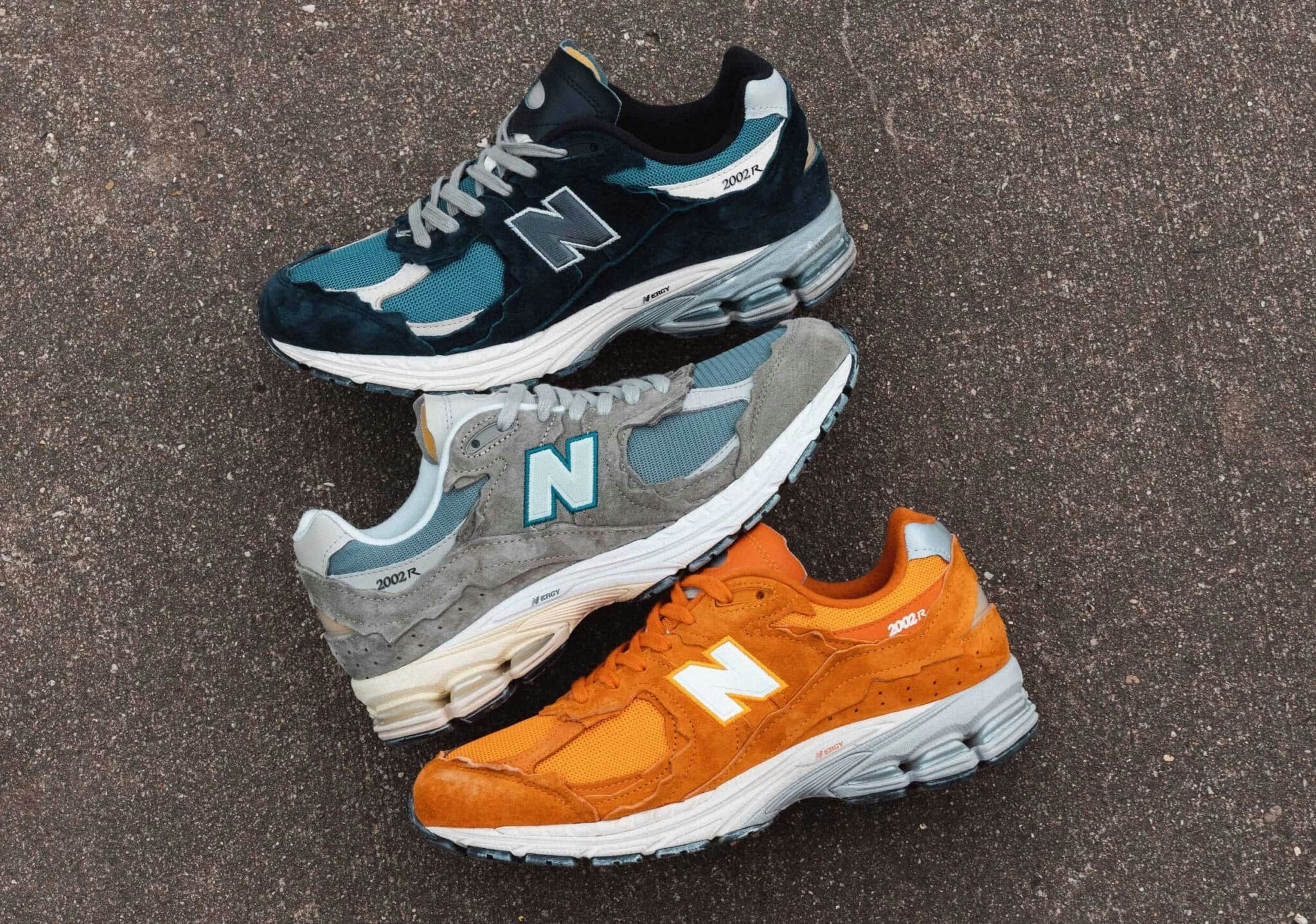 New Balance 2002R "Protection Pack" Blau, Grau & Orange