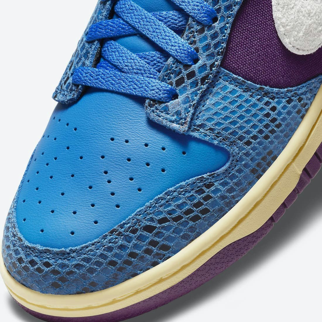 Undefeated x Nike Dunk Low "Blue Purple"