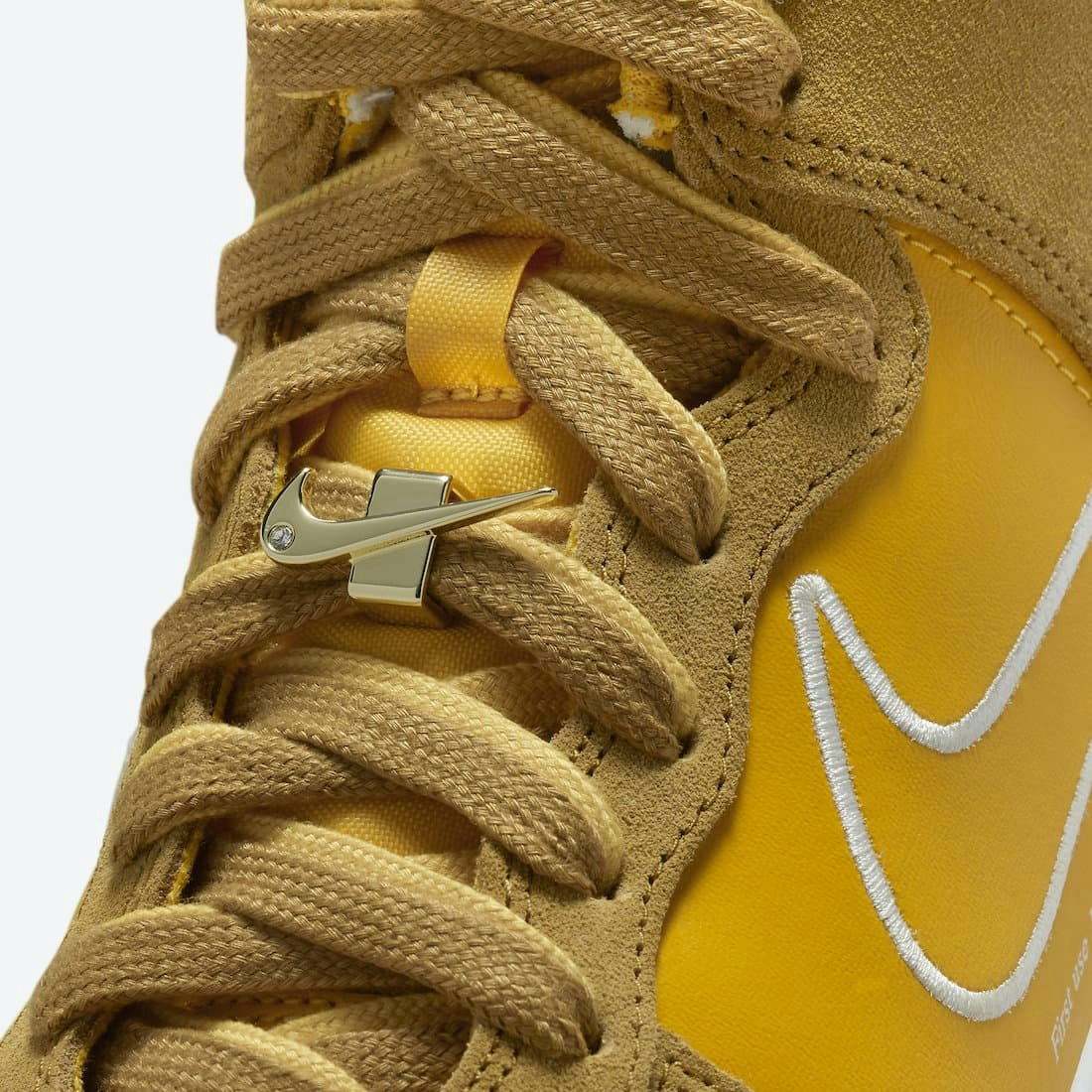 Nike Dunk High “First Use” (University Gold)
