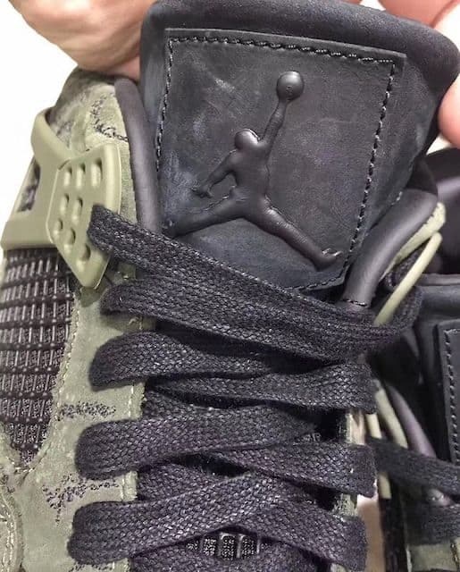 Kaws x Air Jordan 4 "Olive" 