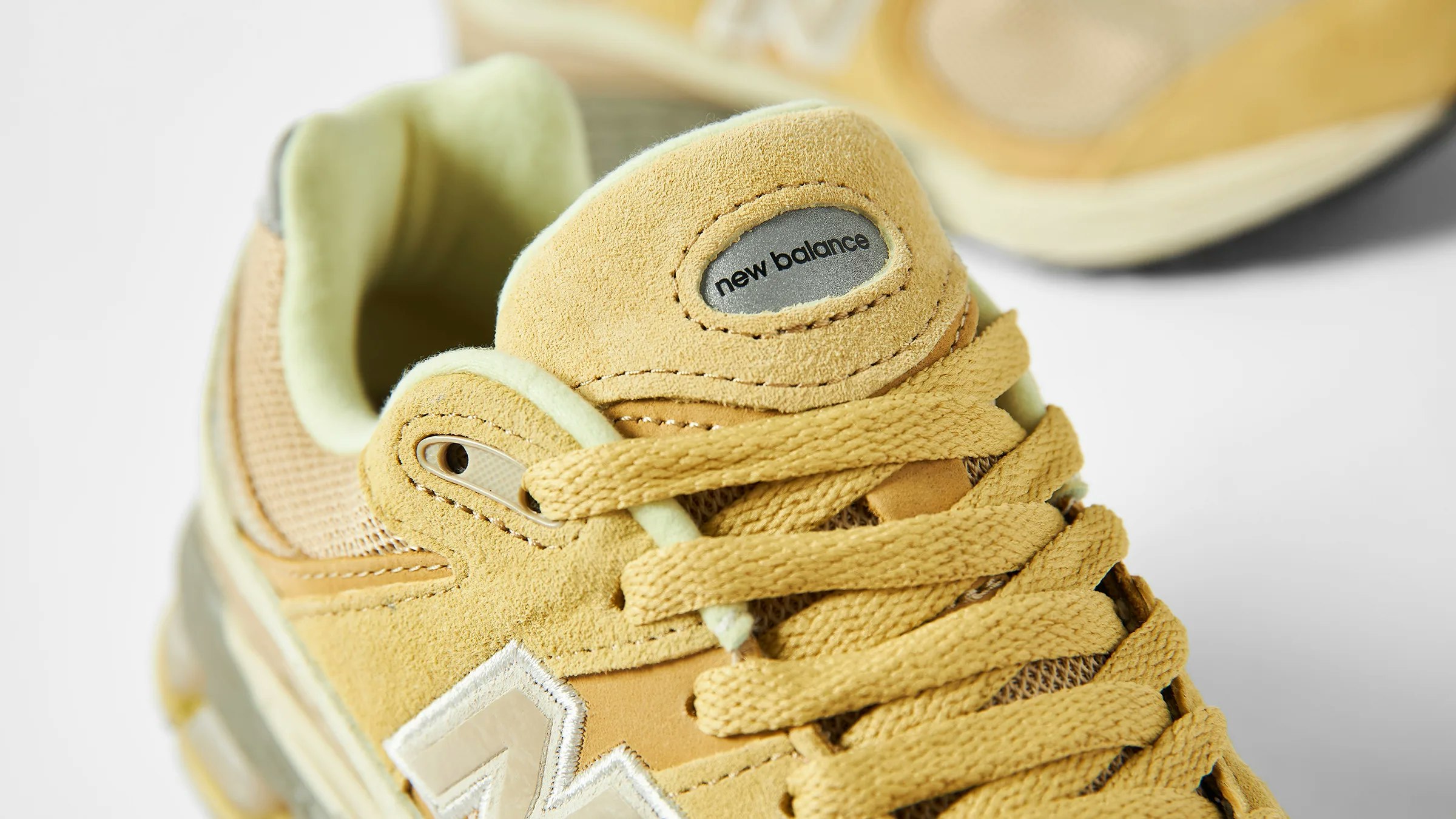 AURALEE x New Balance 2002R "Strong Yellow"