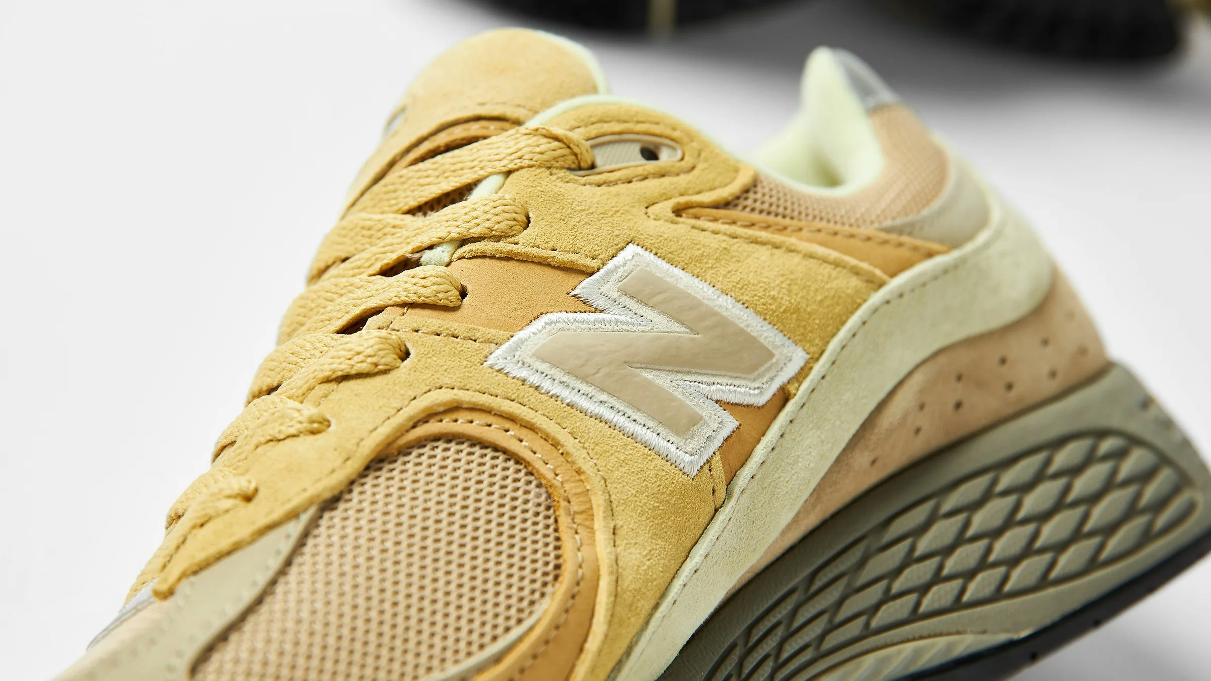 AURALEE x New Balance 2002R "Strong Yellow"