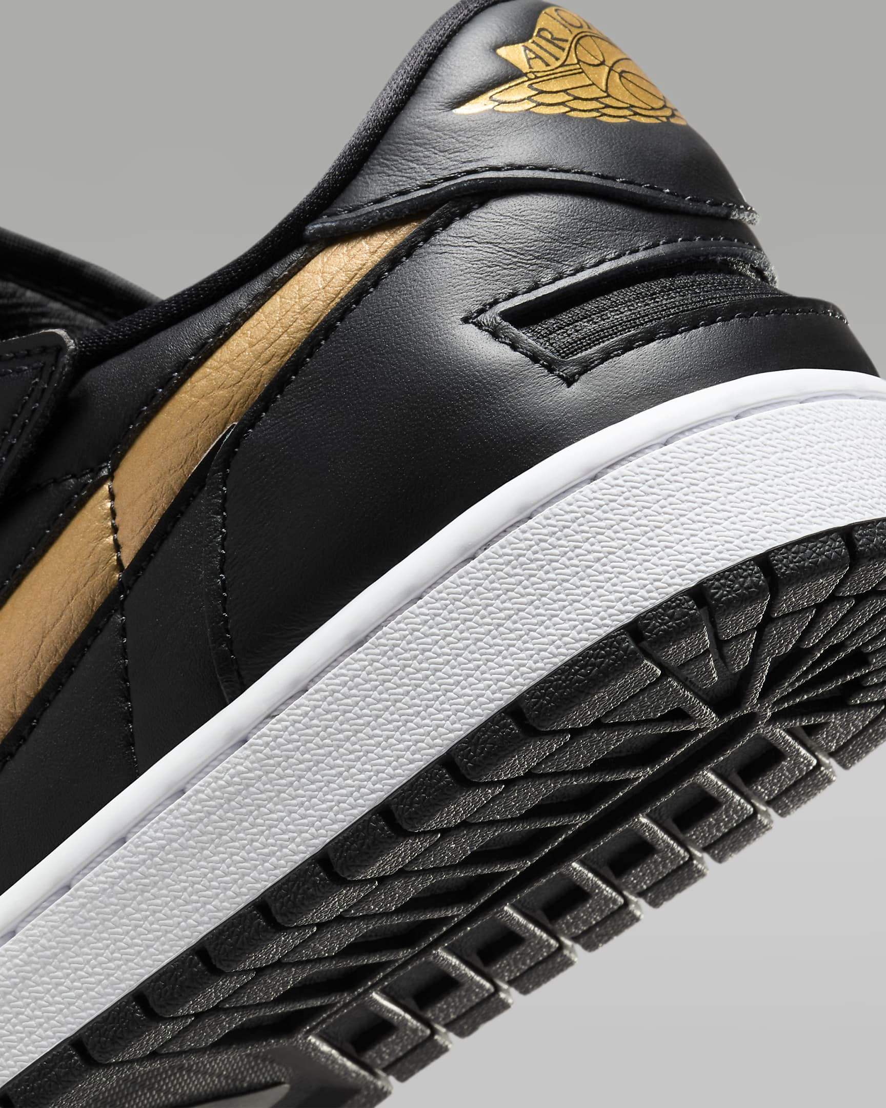 jordan 1 low black gold
