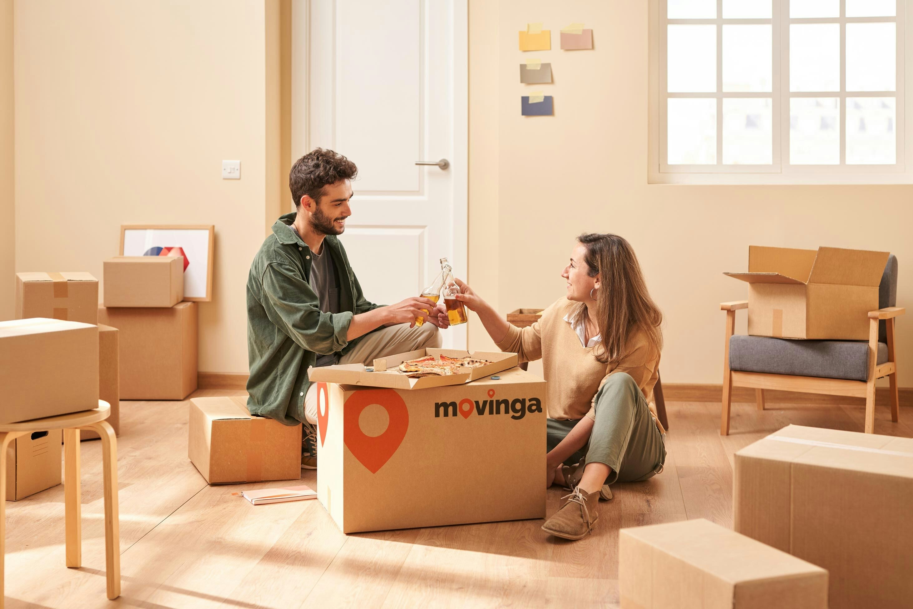 Movinga couple with boxes