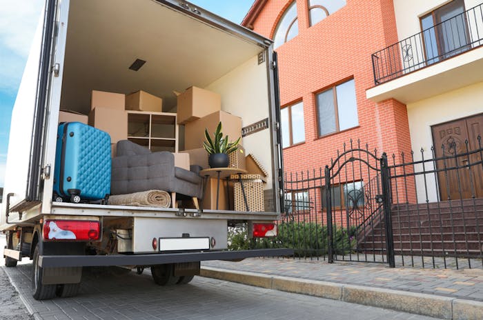 Additional cargo: A truck stacked with furniture and boxes