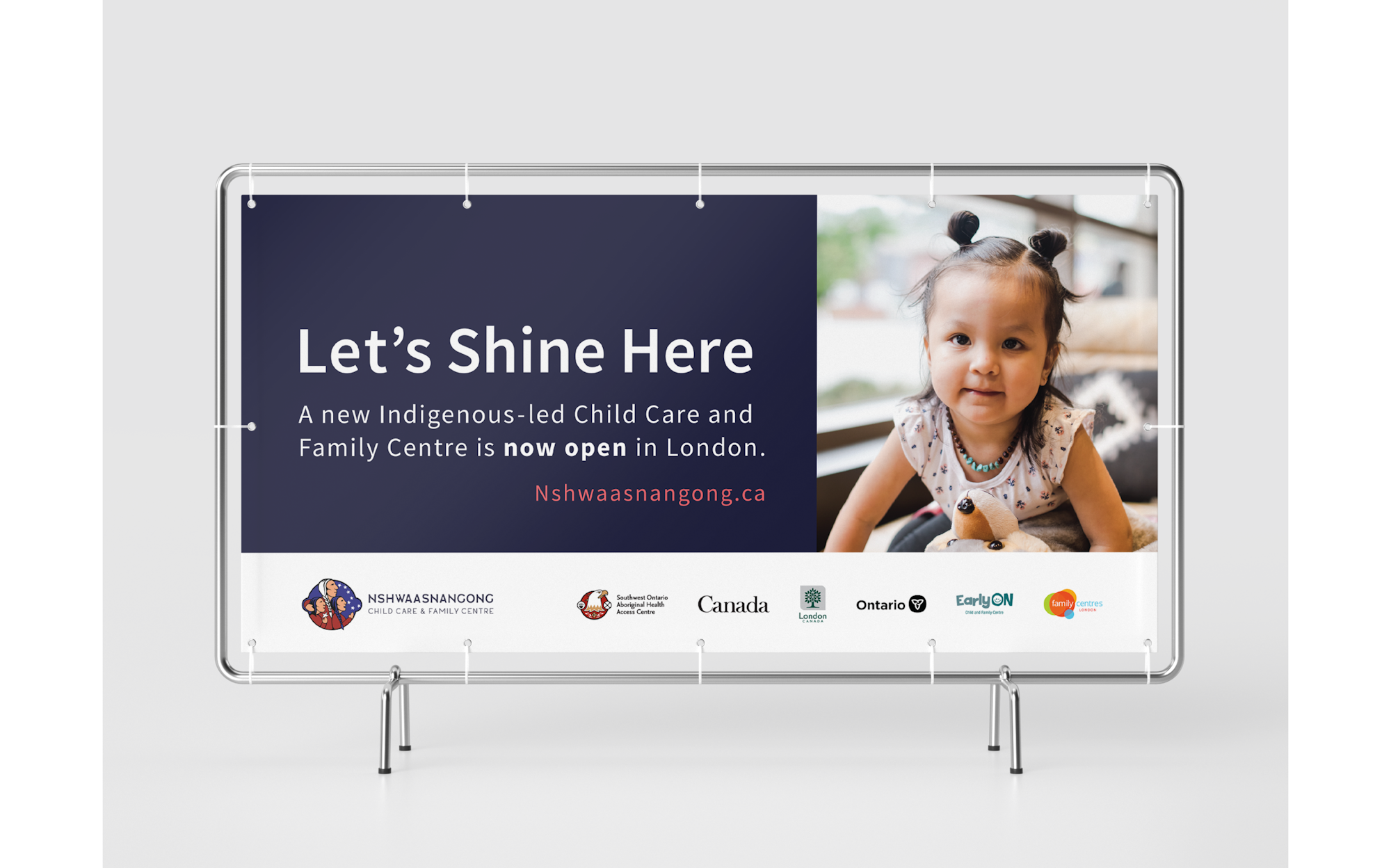Fence Sign - Let's Shine Here. A new Indigenous-led Child Care and Family Centre is now open in London. Nshwaasnangong.ca