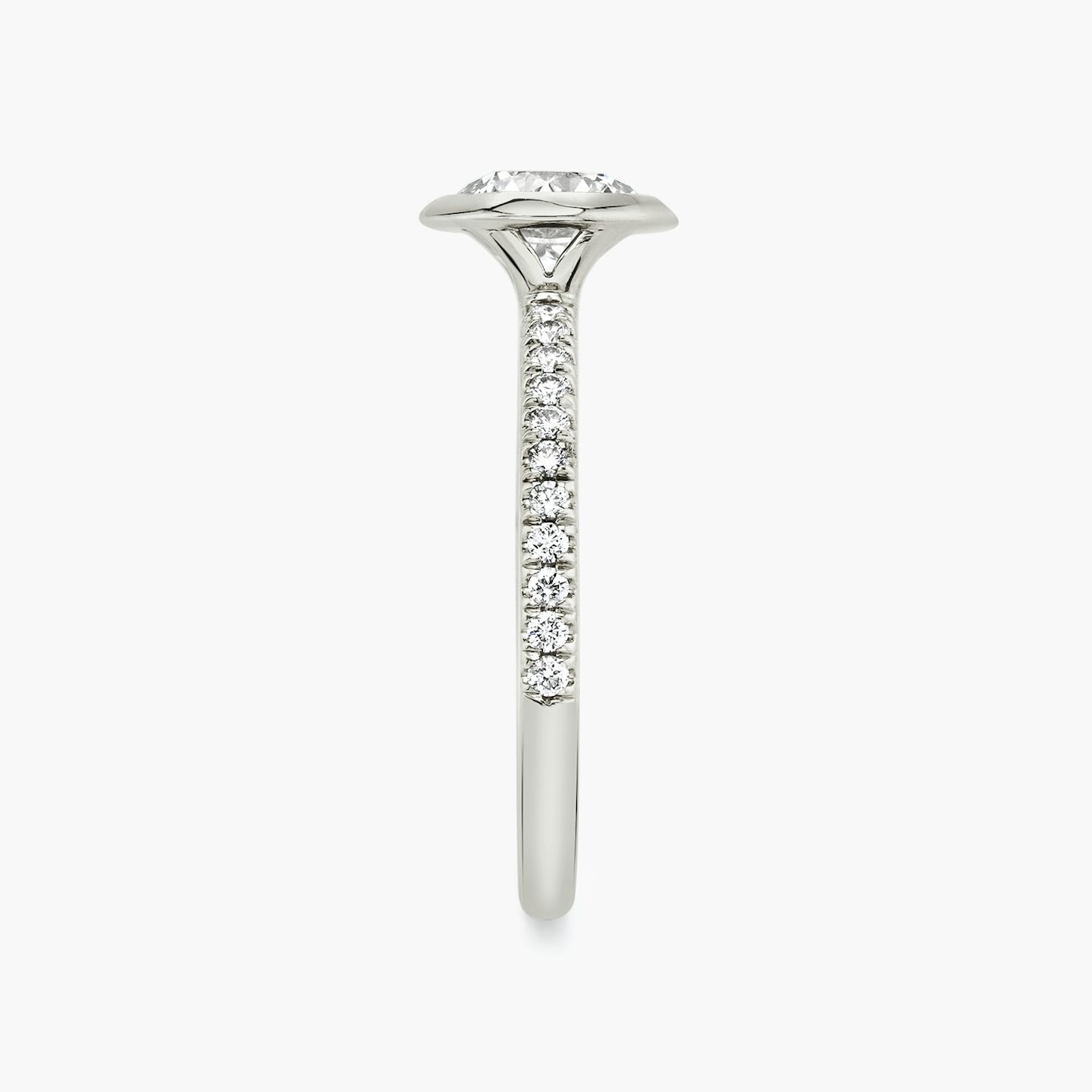 The Signature Bezel | Round Brilliant | Platinum | Band: Pavé | Carat weight: See full inventory | Diamond orientation: vertical