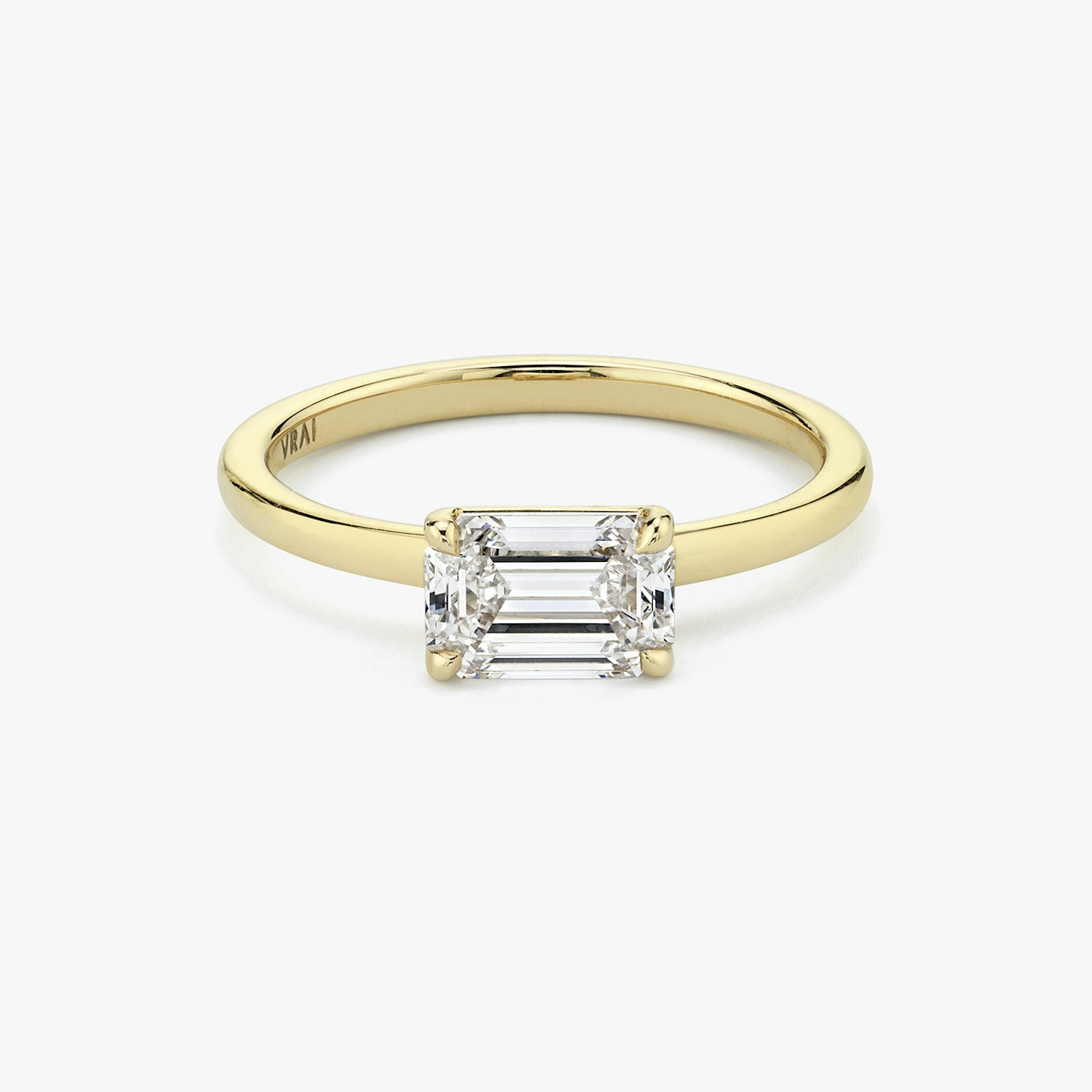 Signature Prong Engagement Ring Signature prong East West emerald cut engagement ring