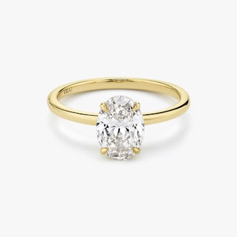 an engagement ring with oval cut diamond
