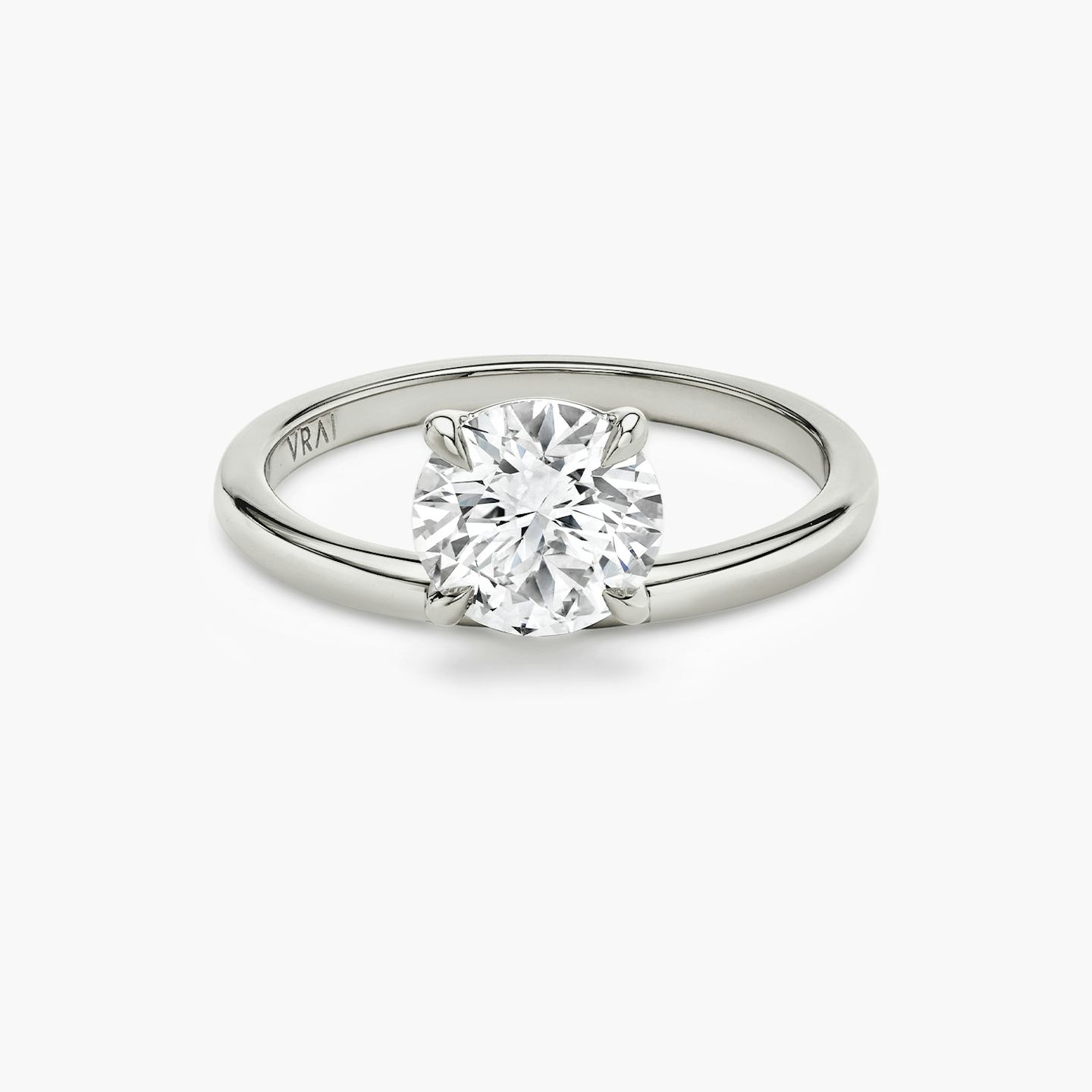 The Hover | Round Brilliant | Platinum | Band: Plain | Carat weight: See full inventory | Diamond orientation: vertical