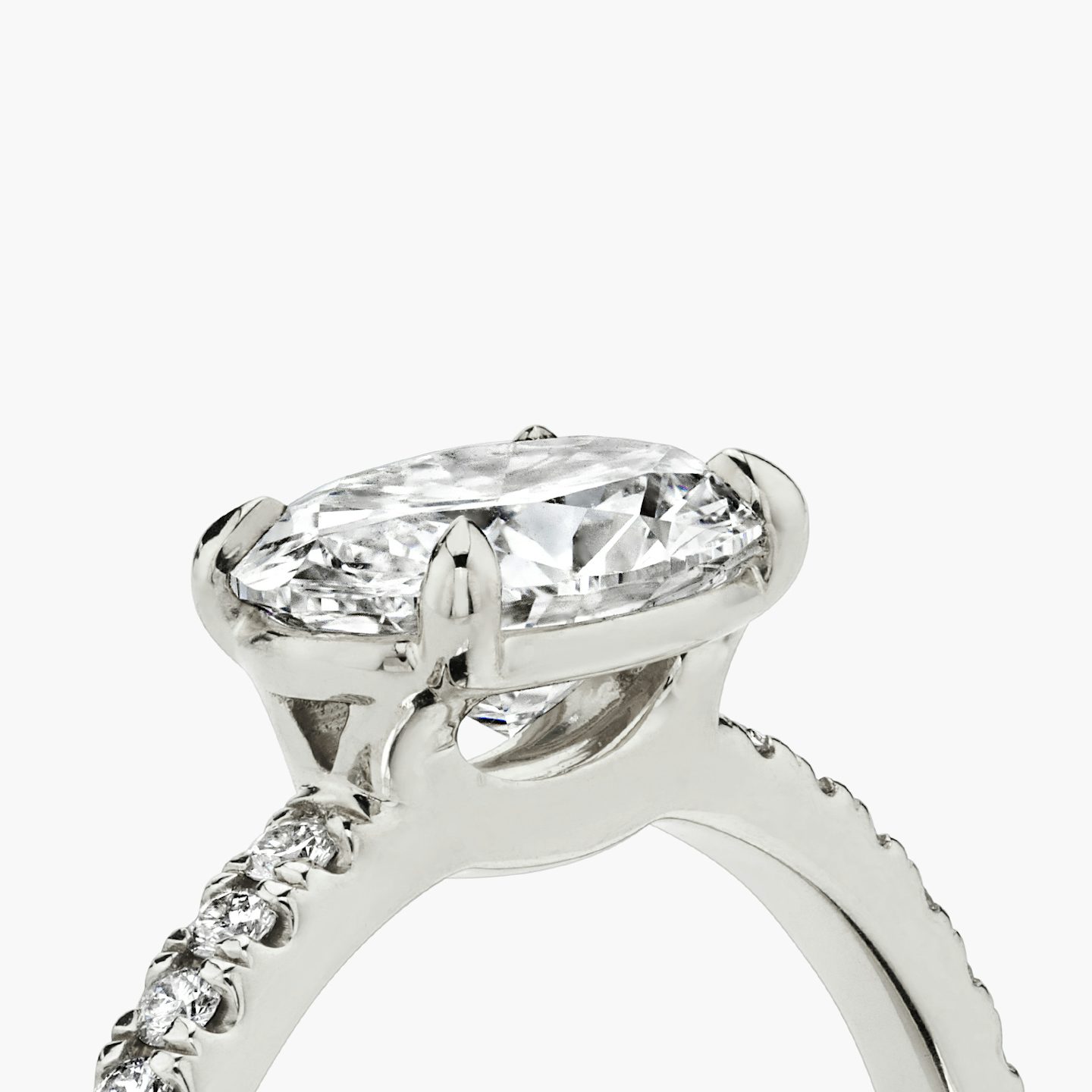 The Signature | Oval | Platinum | Band width: Standard | Band: Pavé | Setting style: Plain | Diamond orientation: Horizontal | Carat weight: See full inventory
