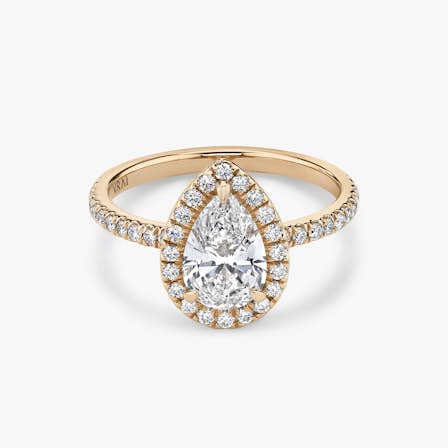 halo pear engagement ring in rose gold