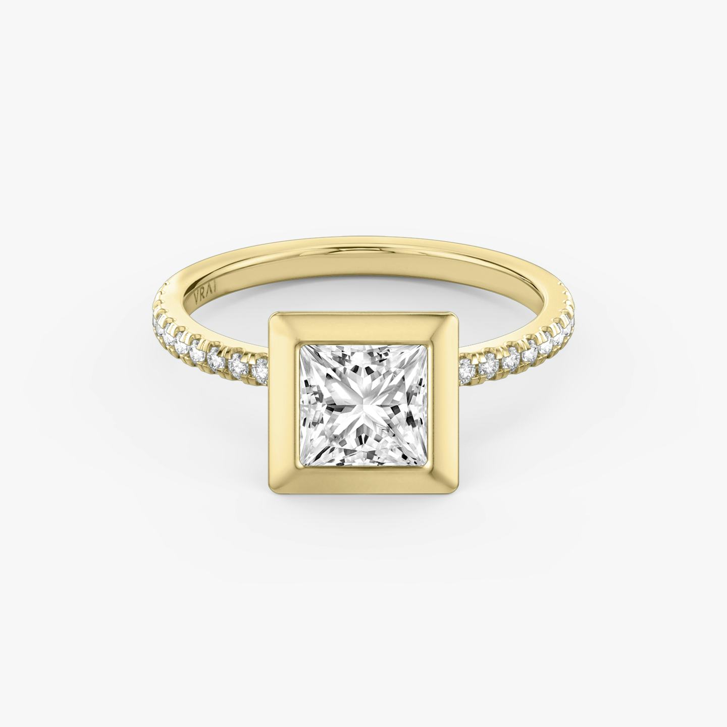 Yellow gold Signature Bezel engagement ring with Princess cut diamond