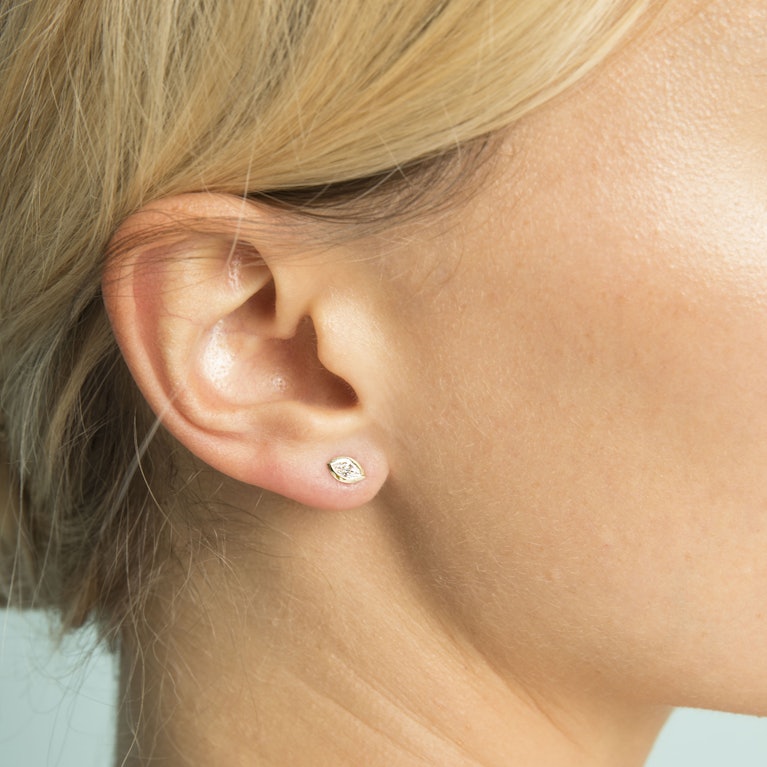 Closeup image of VRAI Bezel Earring