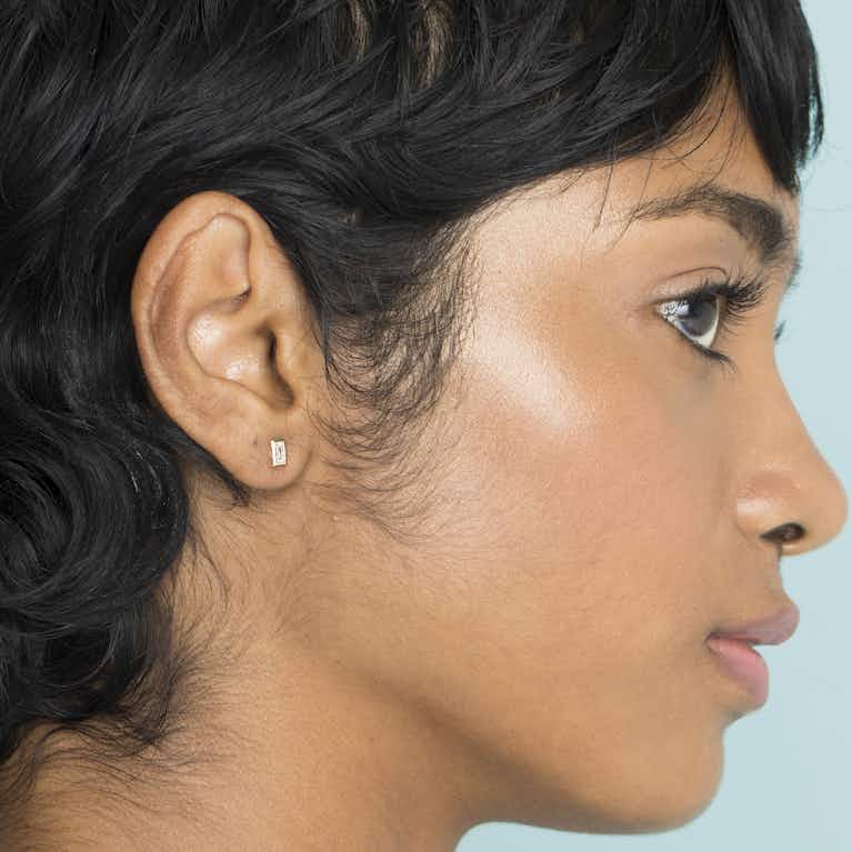 Closeup image of VRAI Bezel Earring