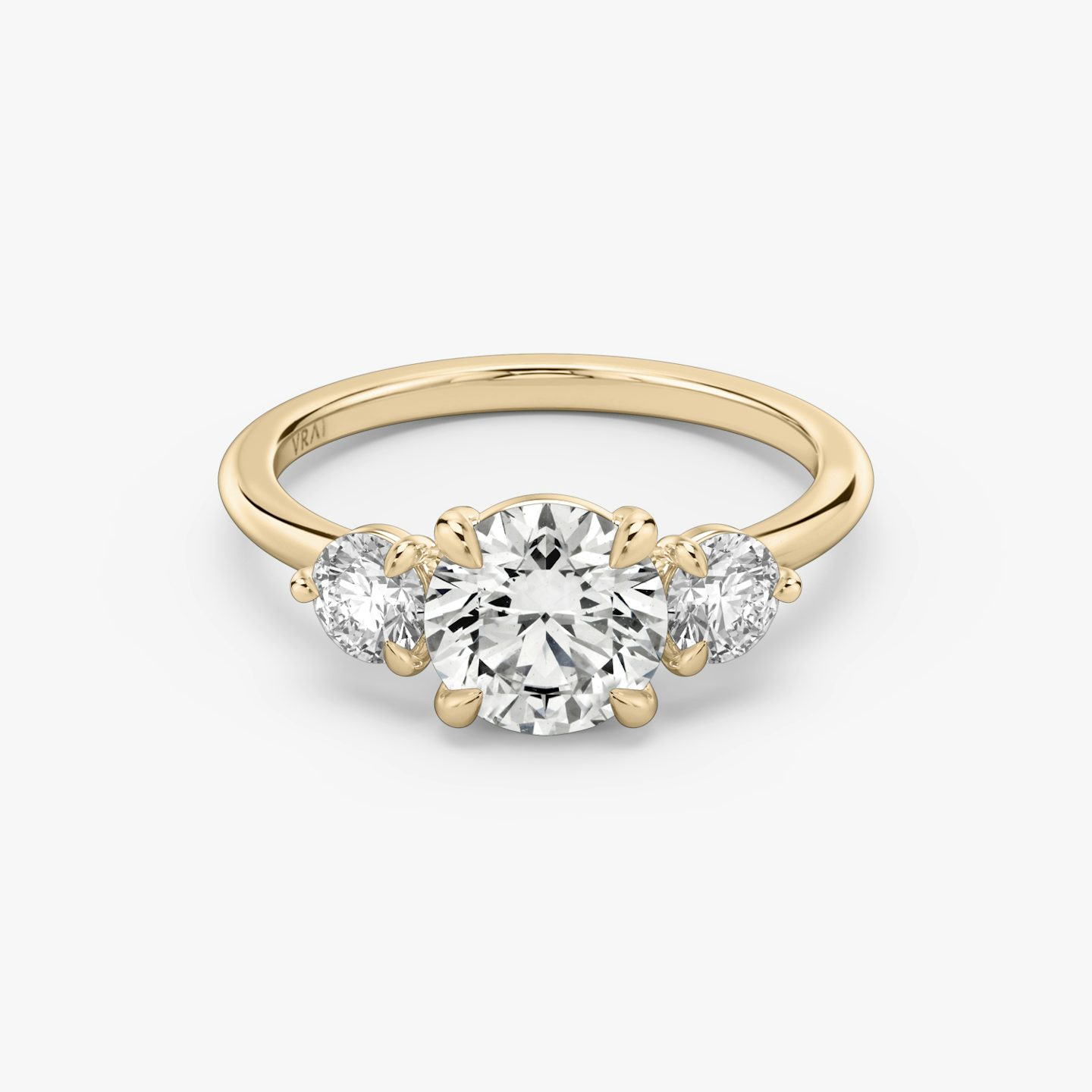 The Three Stone | Round Brilliant | 14k | 14k Rose Gold | Band: Plain | Carat weight: See full inventory | Side stone carat: 1/4 | Side stone shape: Round Brilliant | Diamond orientation: vertical