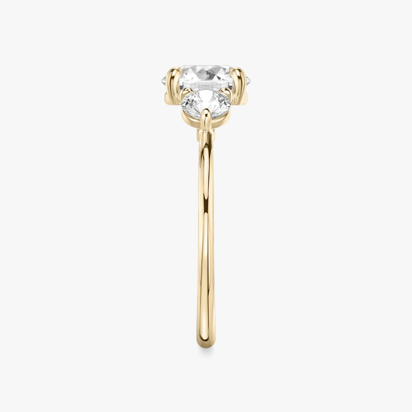 The Three Stone | Round Brilliant | 14k | 14k Rose Gold | Band: Plain | Carat weight: See full inventory | Side stone carat: 1/4 | Side stone shape: Round Brilliant | Diamond orientation: vertical