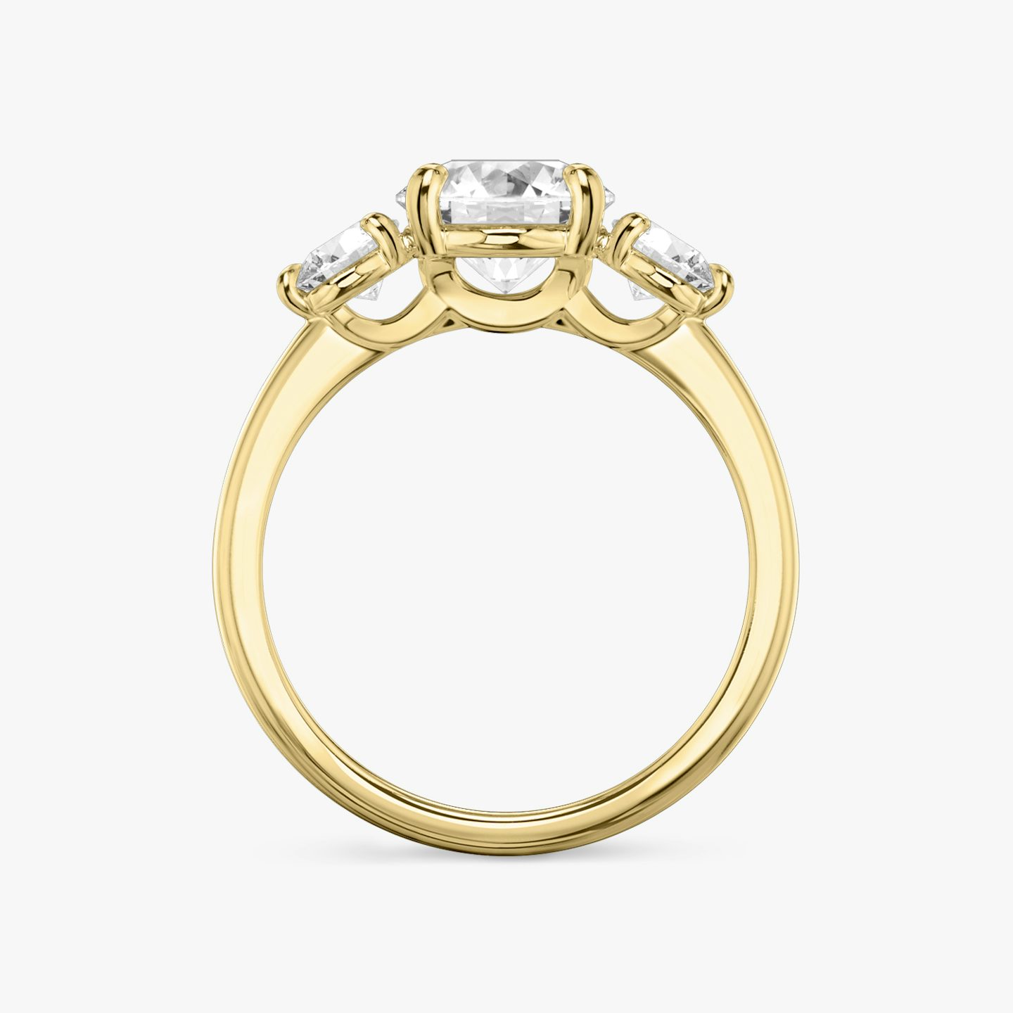 The Three Stone | Round Brilliant | 18k | 18k Yellow Gold | Band: Plain | Carat weight: See full inventory | Side stone carat: 1/4 | Side stone shape: Round Brilliant | Diamond orientation: vertical