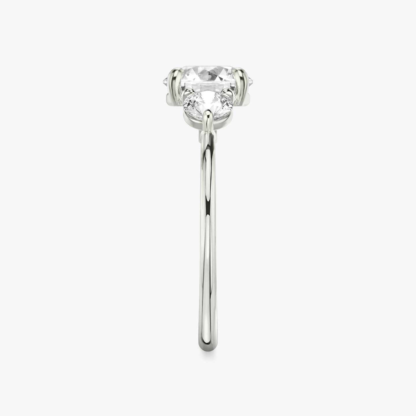 The Three Stone | Round Brilliant | Platinum | Band: Plain | Carat weight: See full inventory | Side stone carat: 1/4 | Side stone shape: Round Brilliant | Diamond orientation: vertical