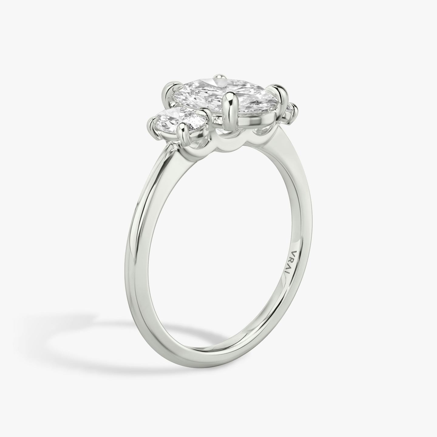 The Three Stone | Oval | 18k | 18k White Gold | Band: Plain | Side stone carat: 1/4 | Side stone shape: Oval | Diamond orientation: vertical | Carat weight: See full inventory