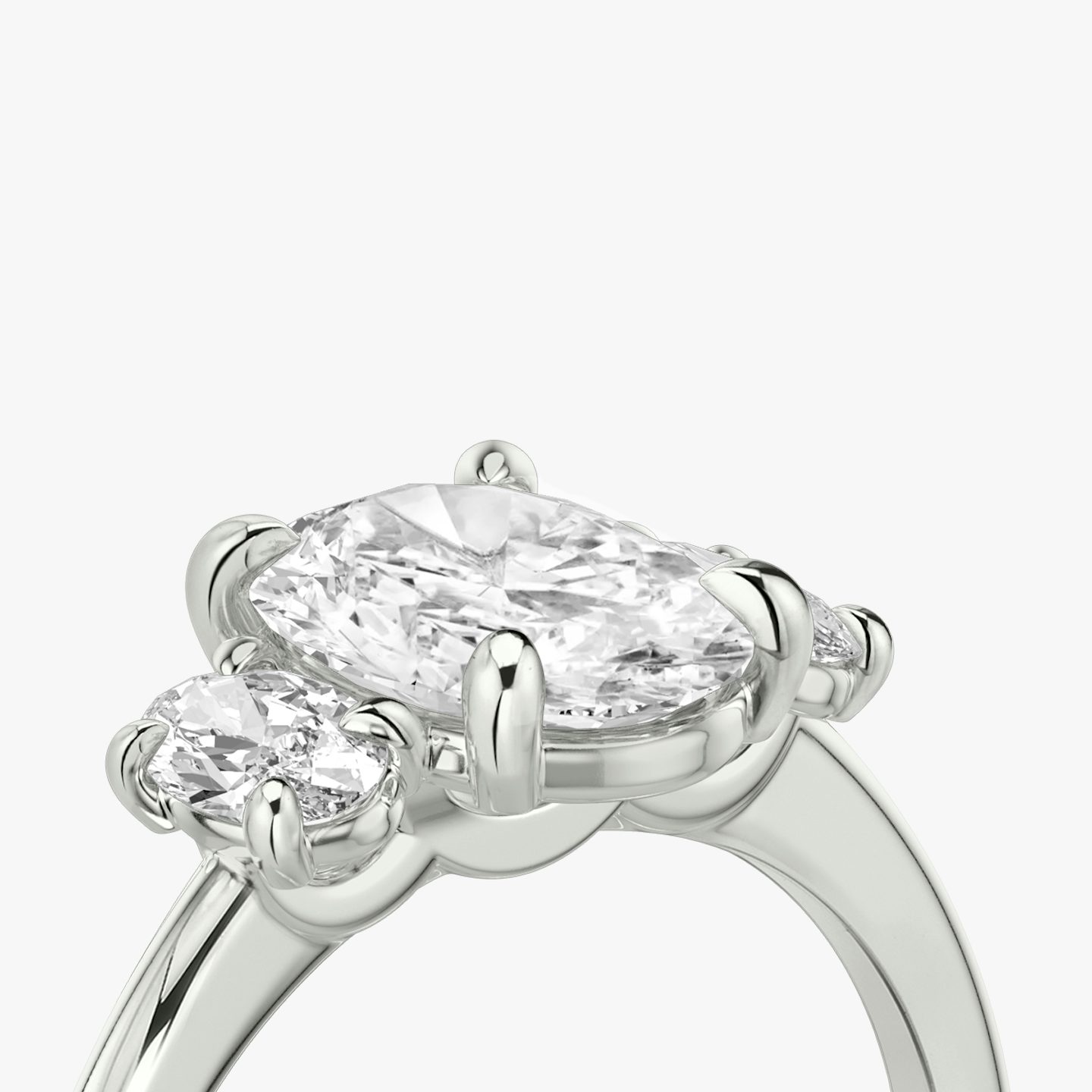 The Three Stone | Oval | Platinum | Band: Plain | Side stone carat: 1/4 | Side stone shape: Oval | Diamond orientation: vertical | Carat weight: See full inventory