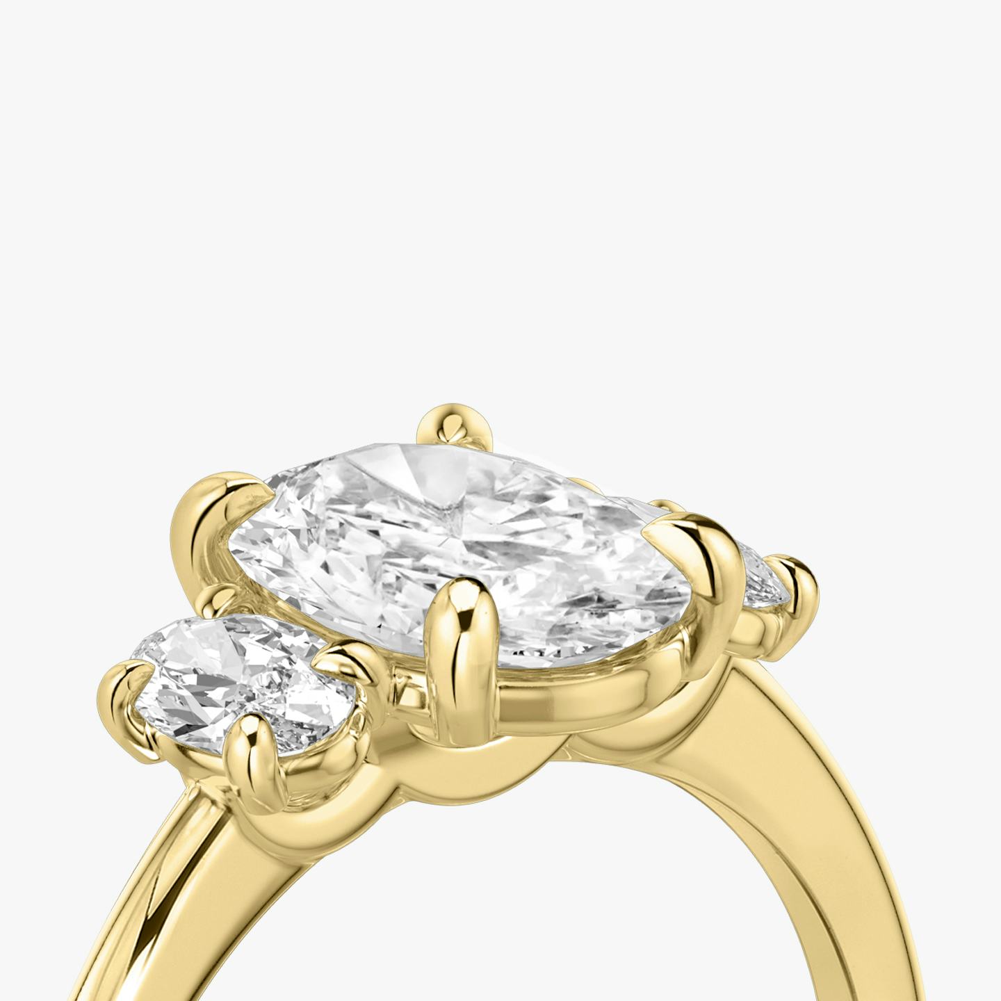 The Three Stone | Oval | 18k | 18k Yellow Gold | Band: Plain | Side stone carat: 1/4 | Side stone shape: Oval | Diamond orientation: vertical | Carat weight: See full inventory