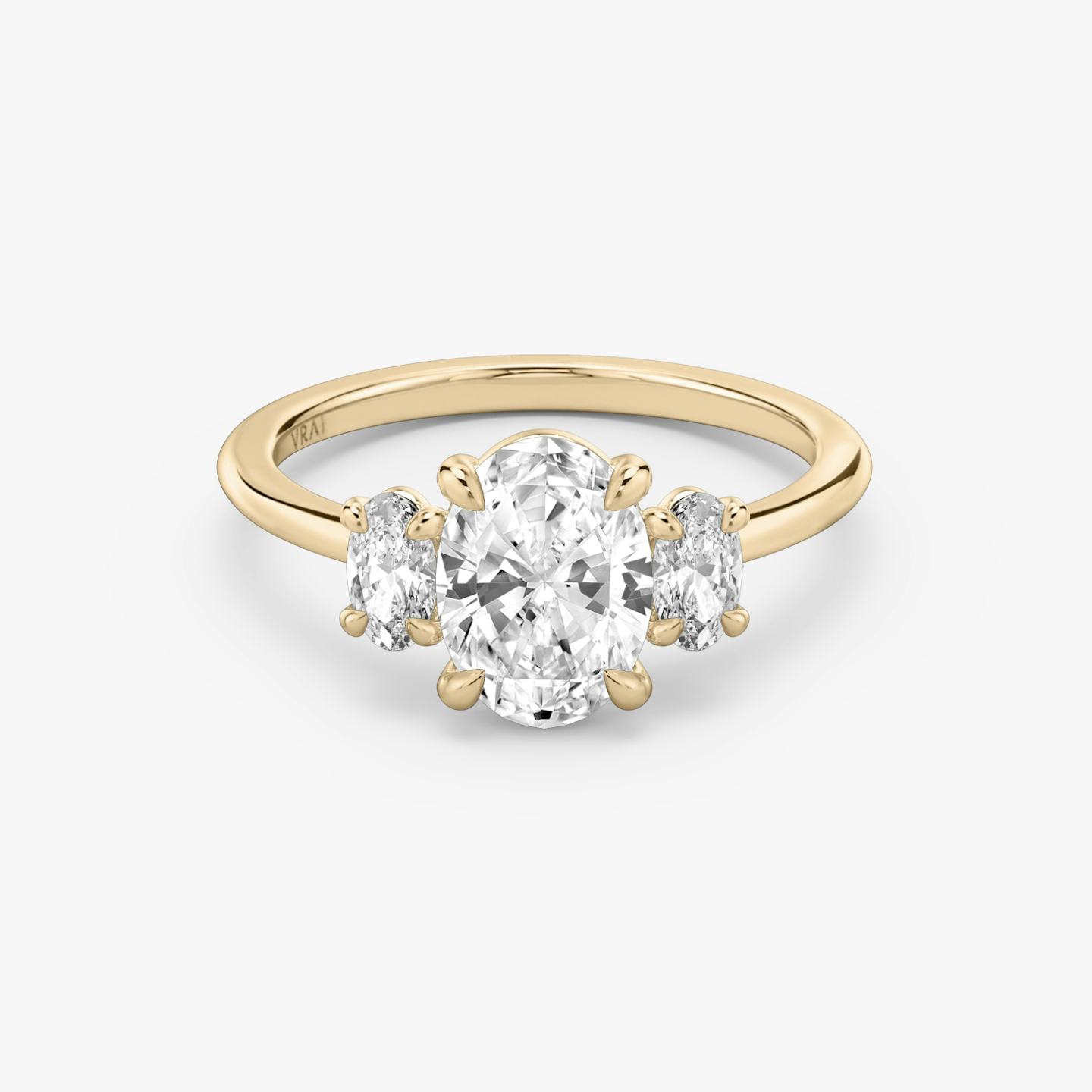 The Three Stone | Oval | 14k | 14k Rose Gold | Band: Plain | Side stone carat: 1/4 | Side stone shape: Oval | Diamond orientation: vertical | Carat weight: See full inventory