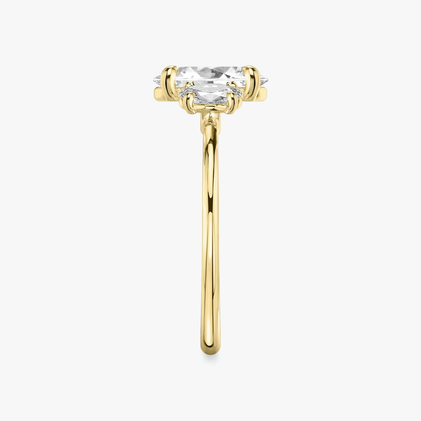 The Three Stone | Oval | 18k | 18k Yellow Gold | Band: Plain | Side stone carat: 1/4 | Side stone shape: Oval | Diamond orientation: vertical | Carat weight: See full inventory