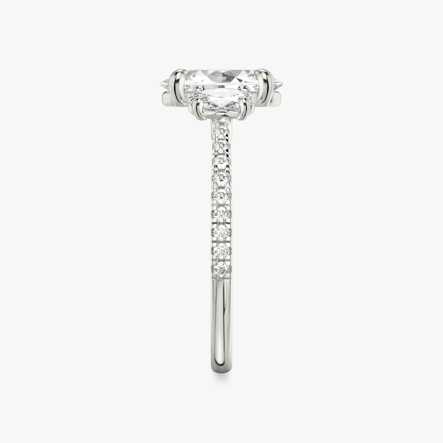 The Three Stone | Oval | 18k | 18k White Gold | Band: Pavé | Side stone carat: 1/4 | Side stone shape: Oval | Diamond orientation: vertical | Carat weight: See full inventory