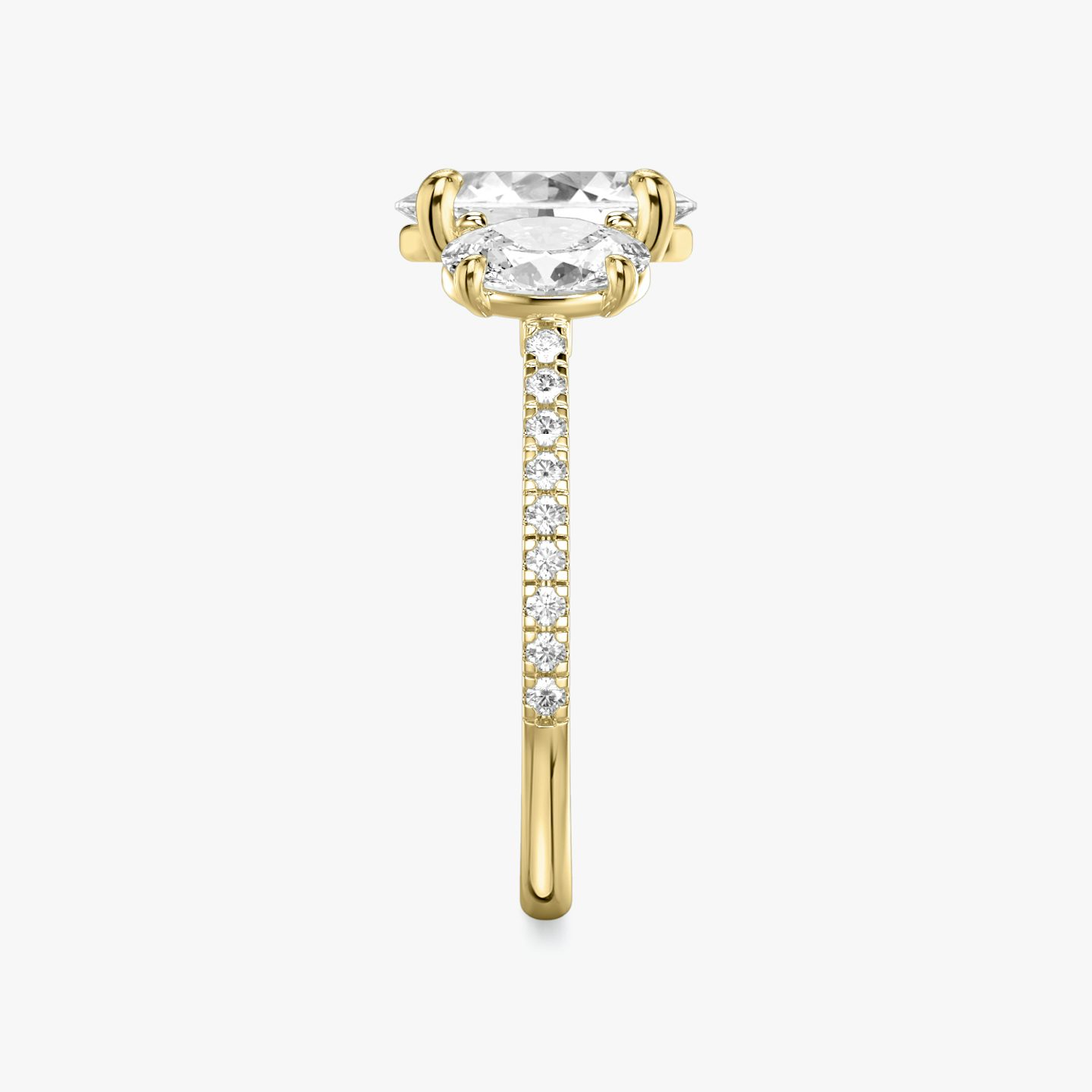The Three Stone | Oval | 18k | 18k Yellow Gold | Band: Pavé | Side stone carat: 1/2 | Side stone shape: Oval | Diamond orientation: vertical | Carat weight: See full inventory