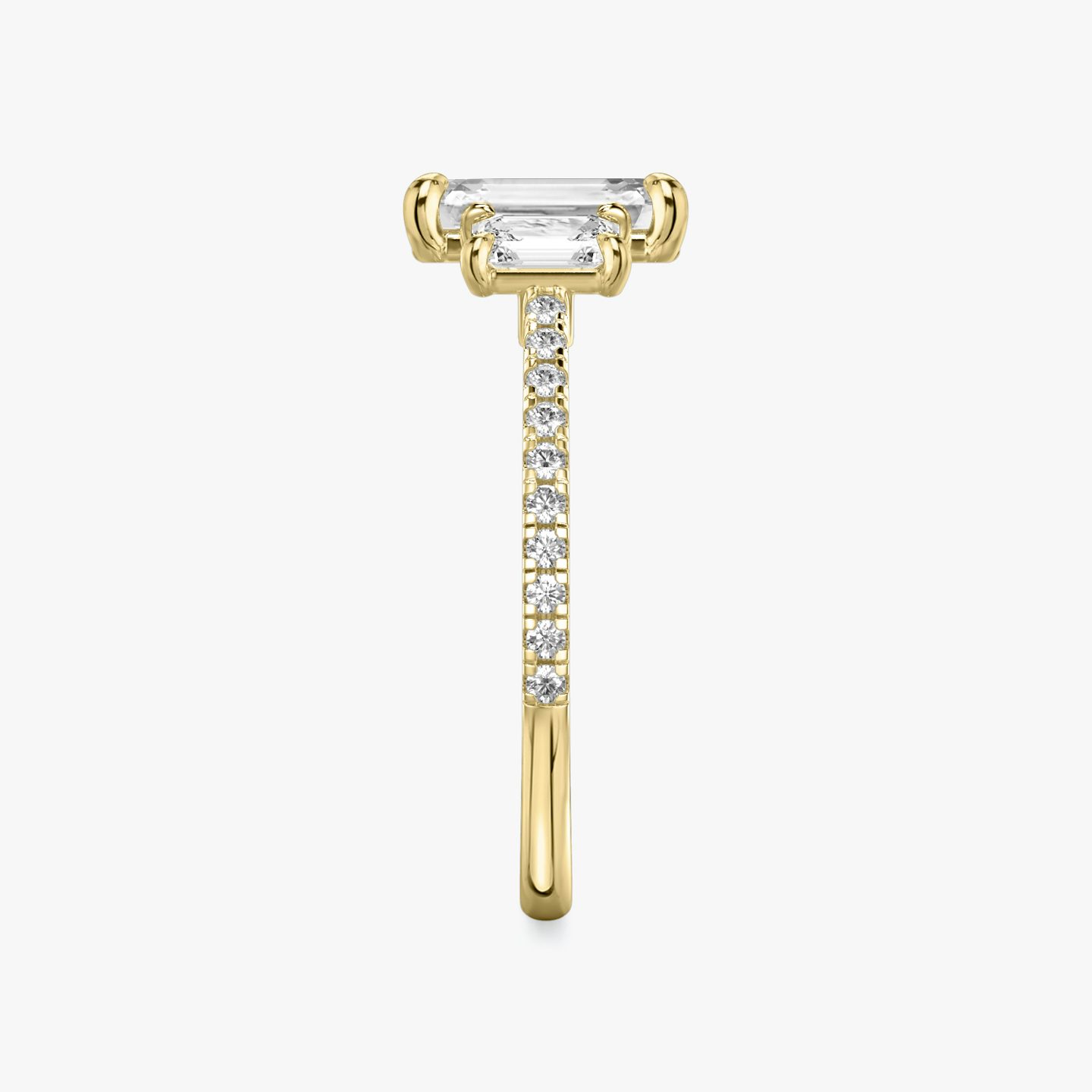 The Three Stone | Emerald | 18k | 18k Yellow Gold | Band: Pavé | Side stone carat: 1/4 | Side stone shape: Emerald | Diamond orientation: vertical | Carat weight: See full inventory