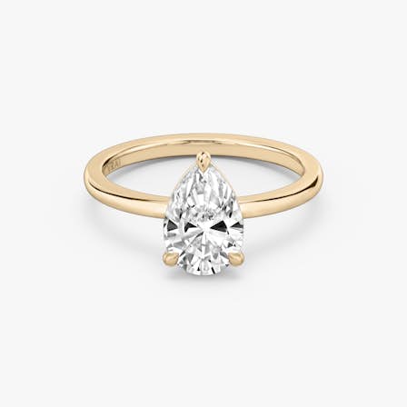 Rose gold Signature Solitaire engagement ring with Pear cut diamond