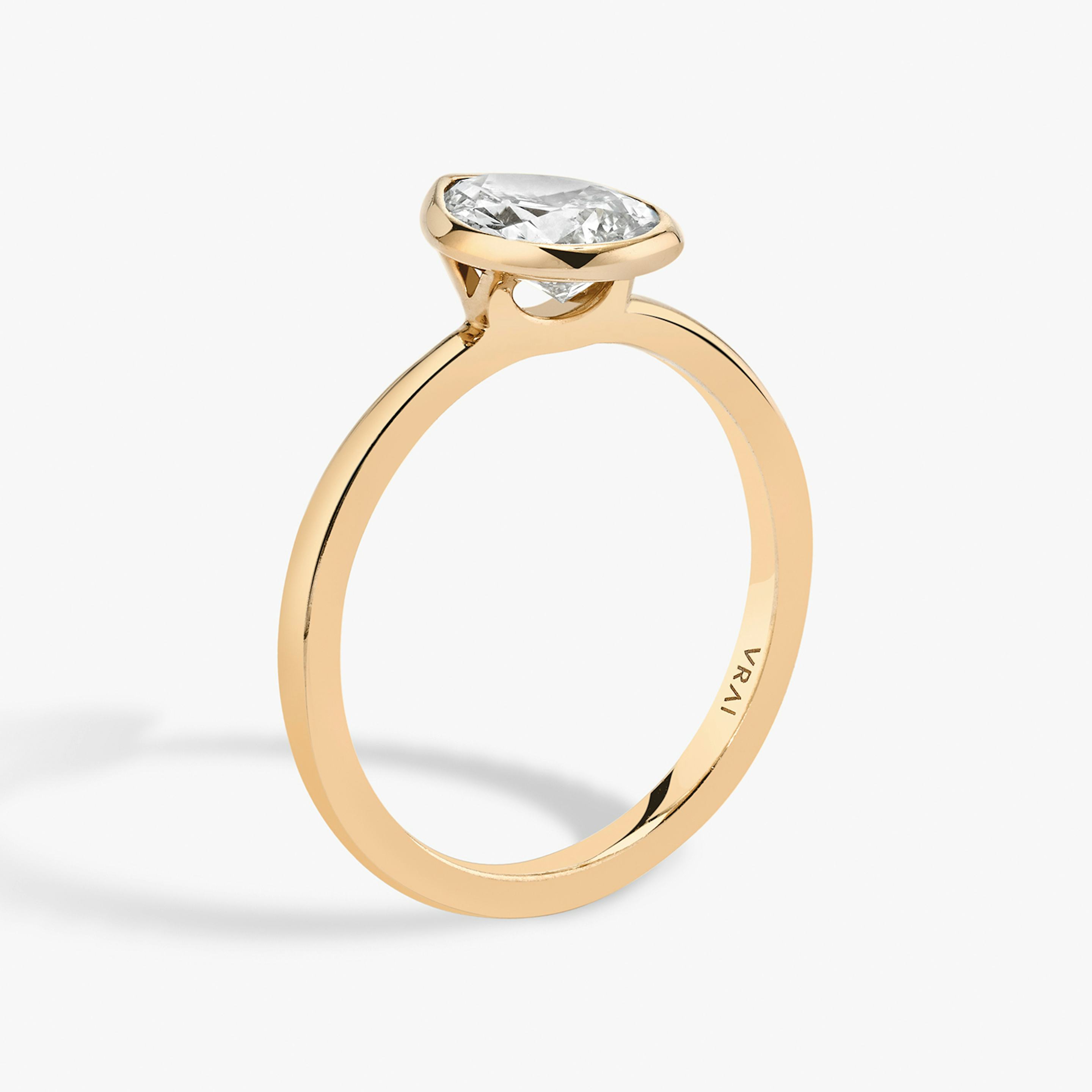 The Signature Bezel | Pear | 14k | 14k Rose Gold | Band: Plain | Diamond orientation: vertical | Carat weight: See full inventory